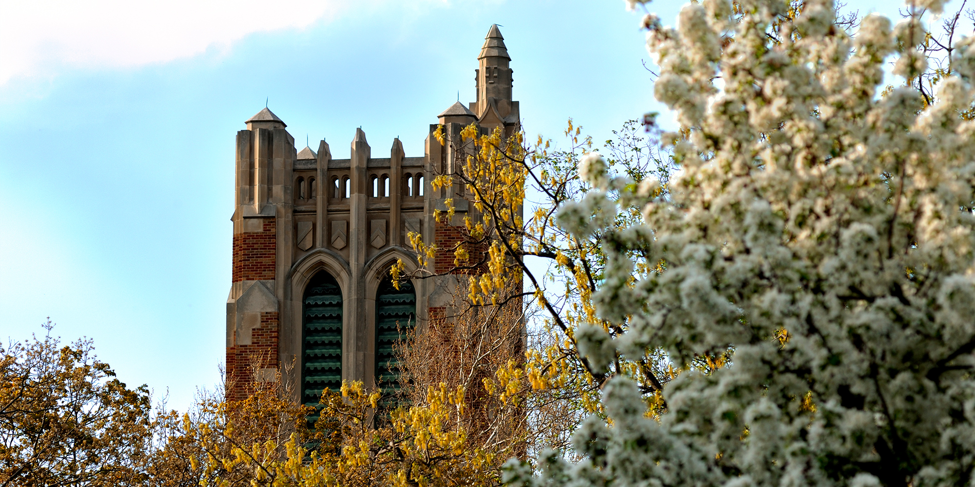 Photo of Beaumont Tower, a red brick building