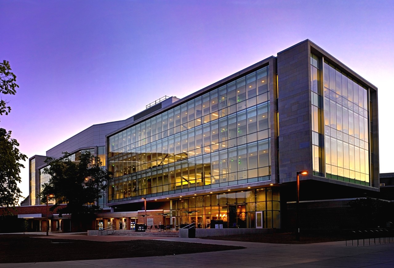 A large building photographed at sunset.
