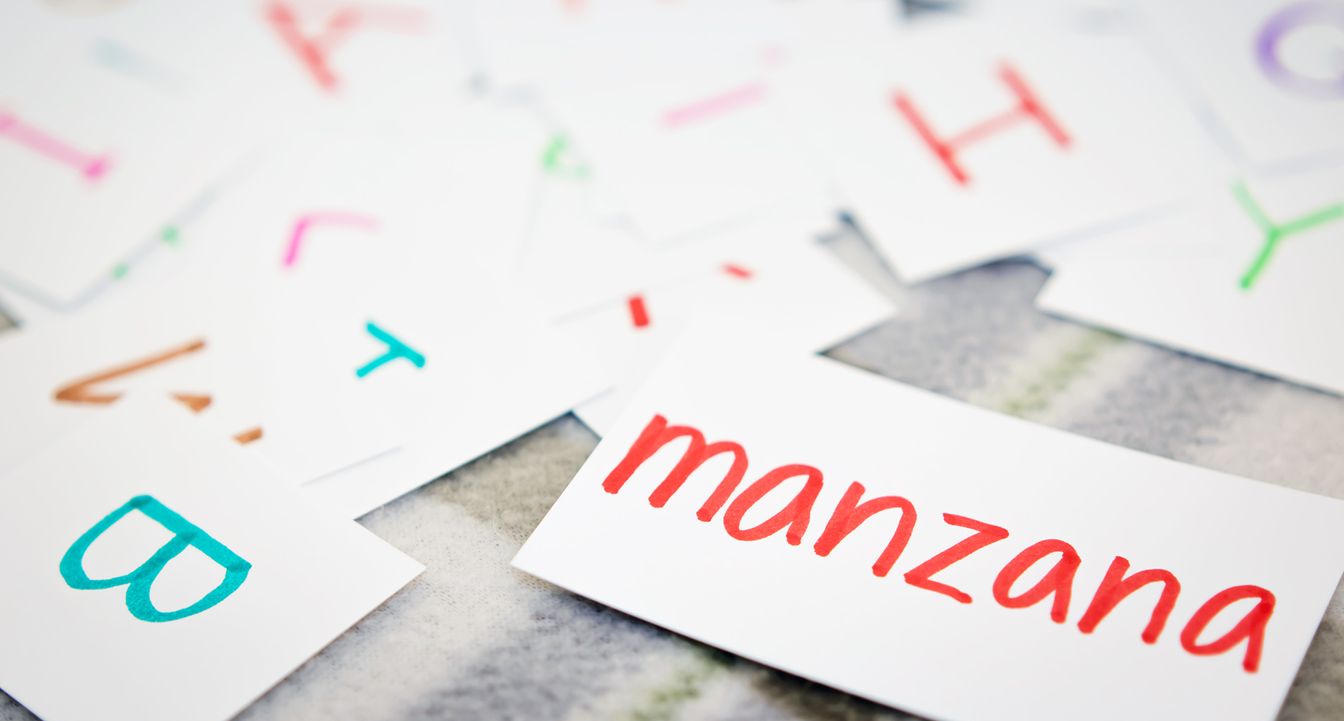 Spanish word flash cards sitting on table