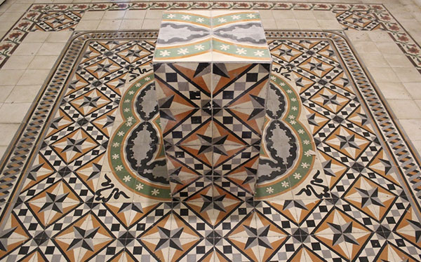 mosiac box sitting on mosaic tile floor