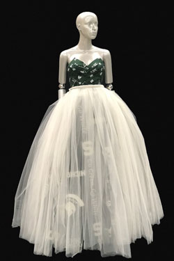 mannequin wearing spartan fabric dress with white tulle overskirt