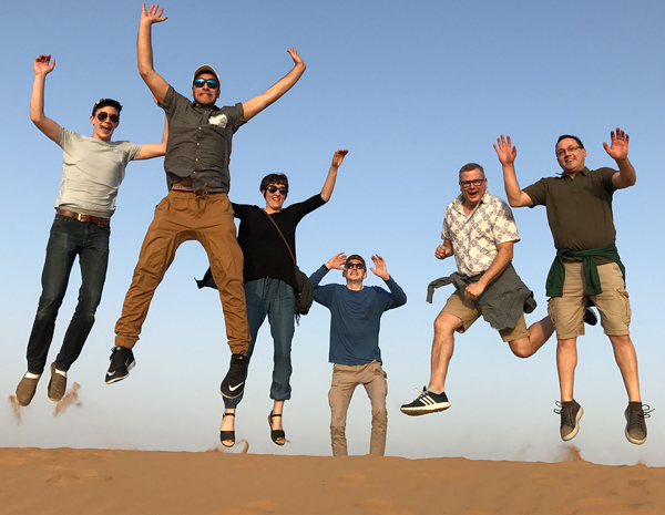 students jumping for a pictue in dubai