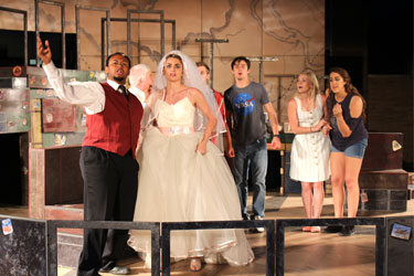 Students performing See Rock City and Other Destinations on stage