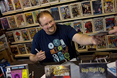 Greg Wright signing comic books