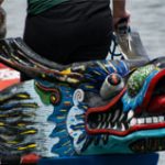 the front of the boat that is a dragon head