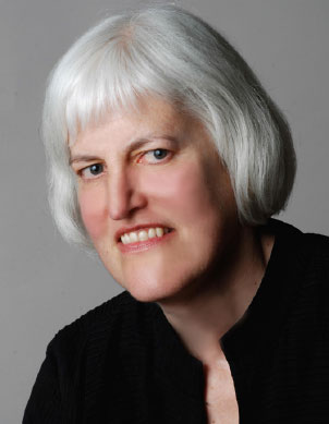 A woman with short white hair