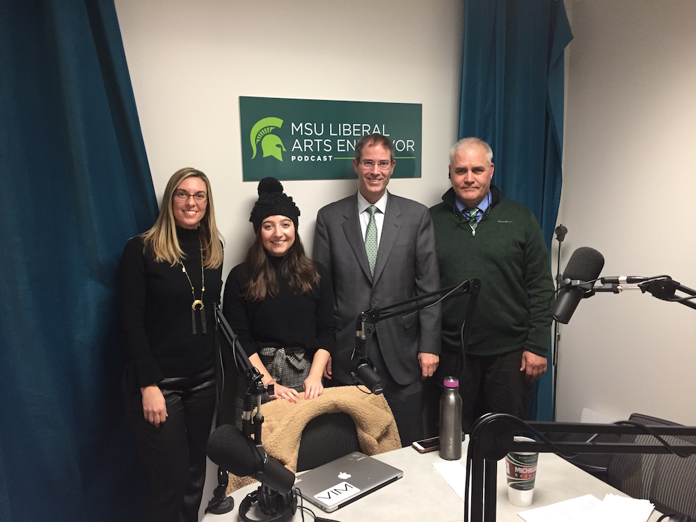2 women and 2 men posing for a picture in the liberal arts endeavor podcast studio