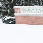 Michigan State University sign in the winter