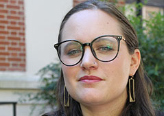 headshot of woman with glasses