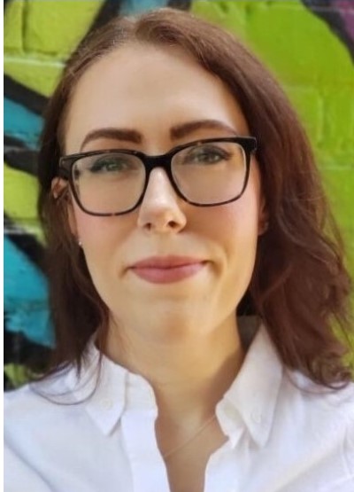 woman wearing a white shirt and glasses