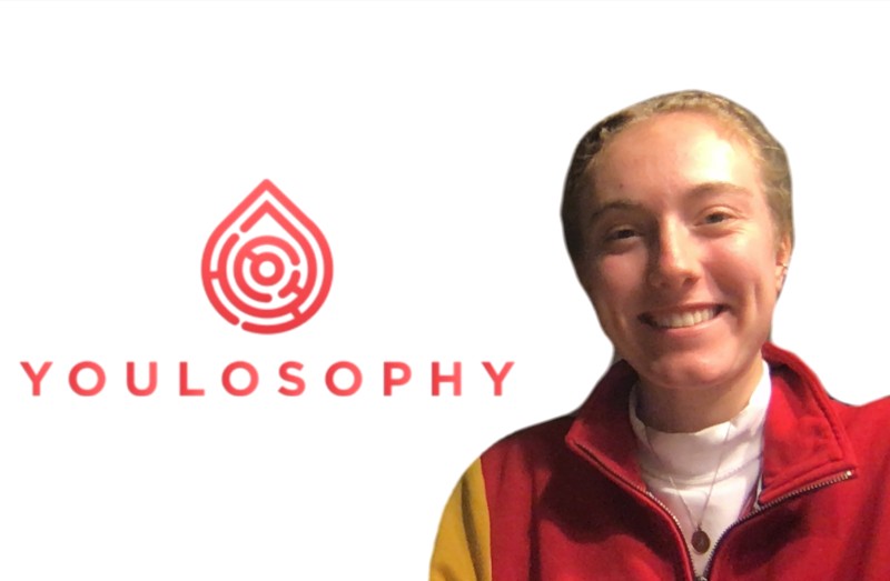 An image of a woman smiling next to a Youlosophy logo.