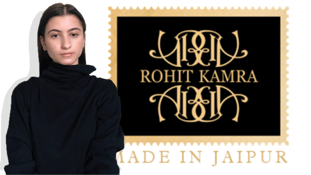 Young woman in a black top with the Rohit Kamra logo to her right.