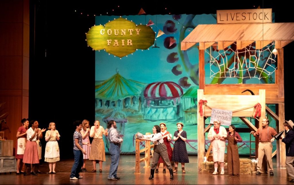 A picture of a theater production of Charlotte's Web.