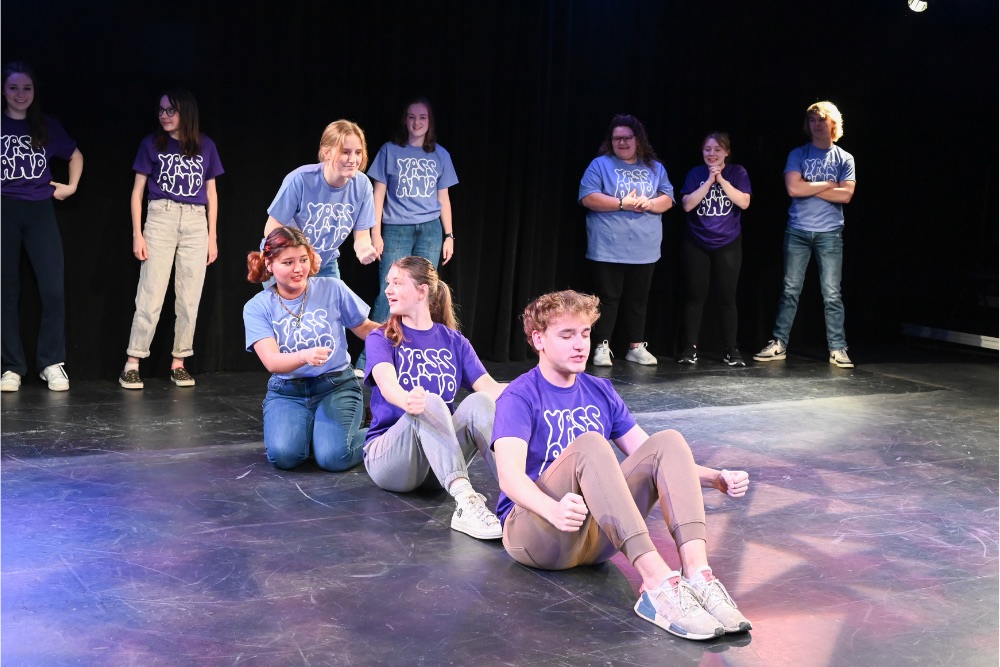 Team Orange. and Team Purple Reign perform improv comedy for MSU Unscripted 2023.