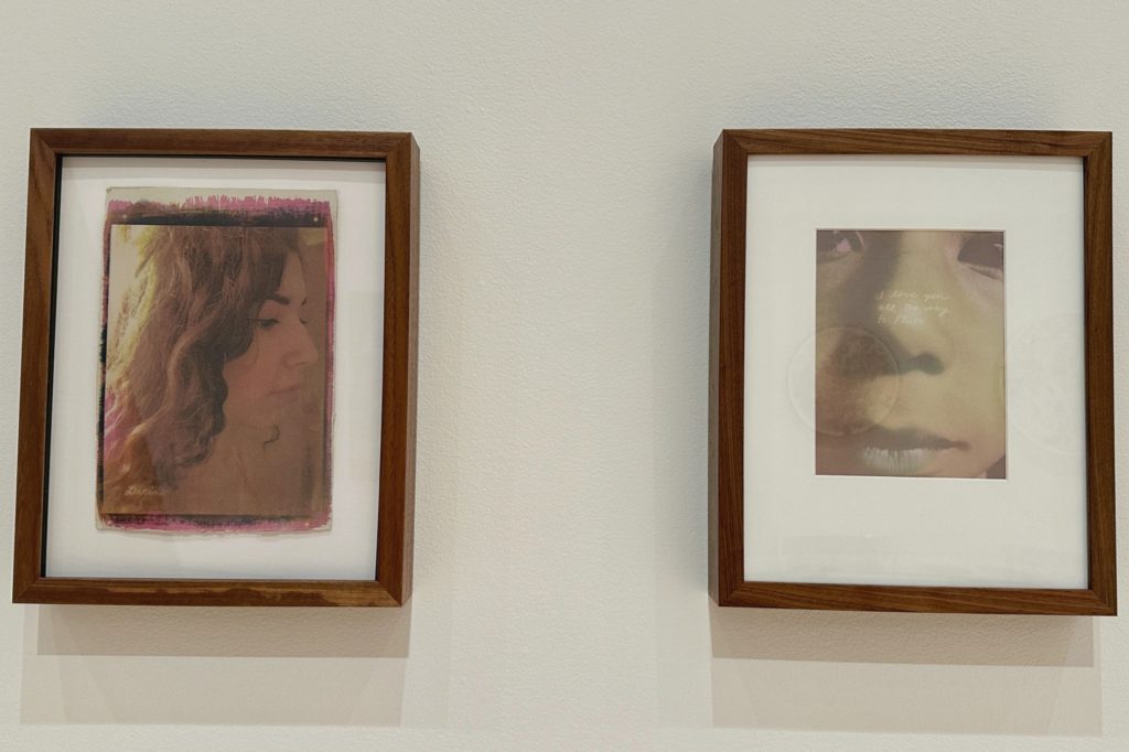A picture of two paintings side by side before a tan wall.